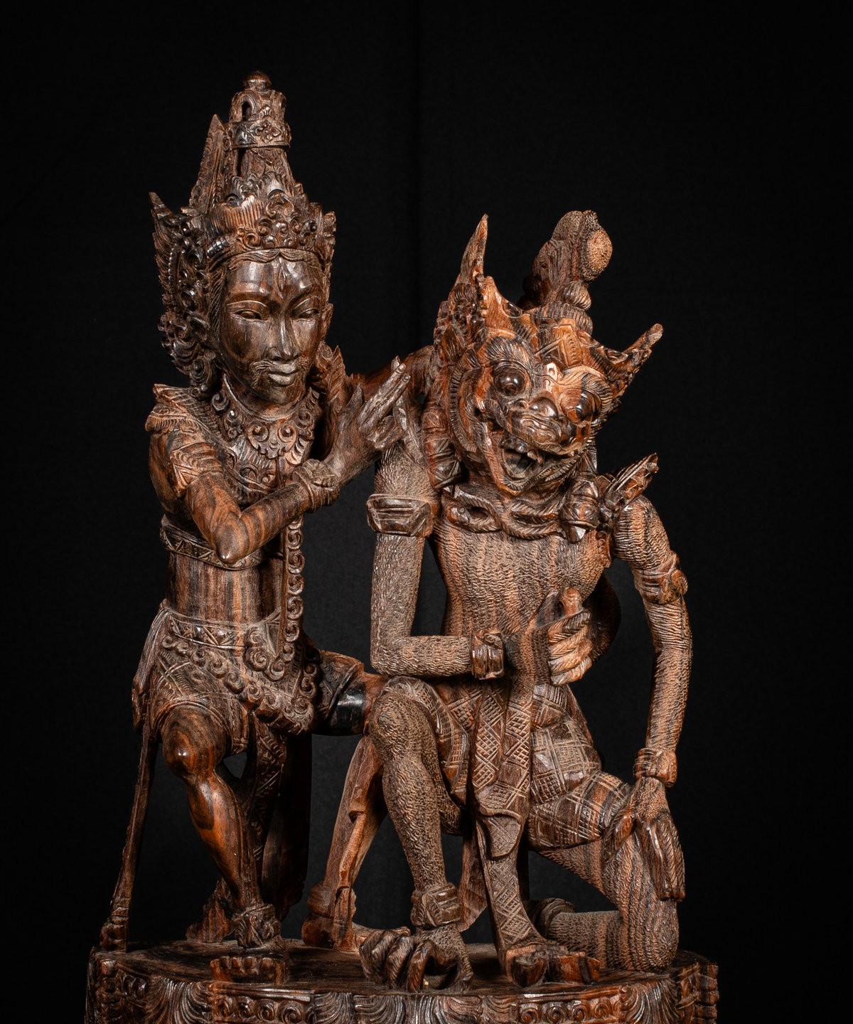 Balinese wood carving – Barong with attendant 48cm